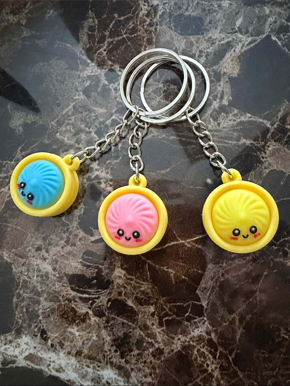 Squishy Face Keychain Set with Yellow Frame and Colorful Faces (3) - Picture 3 of 3